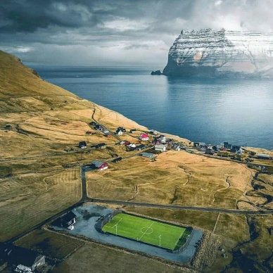 Футбольное поле возле городка на Фарерах